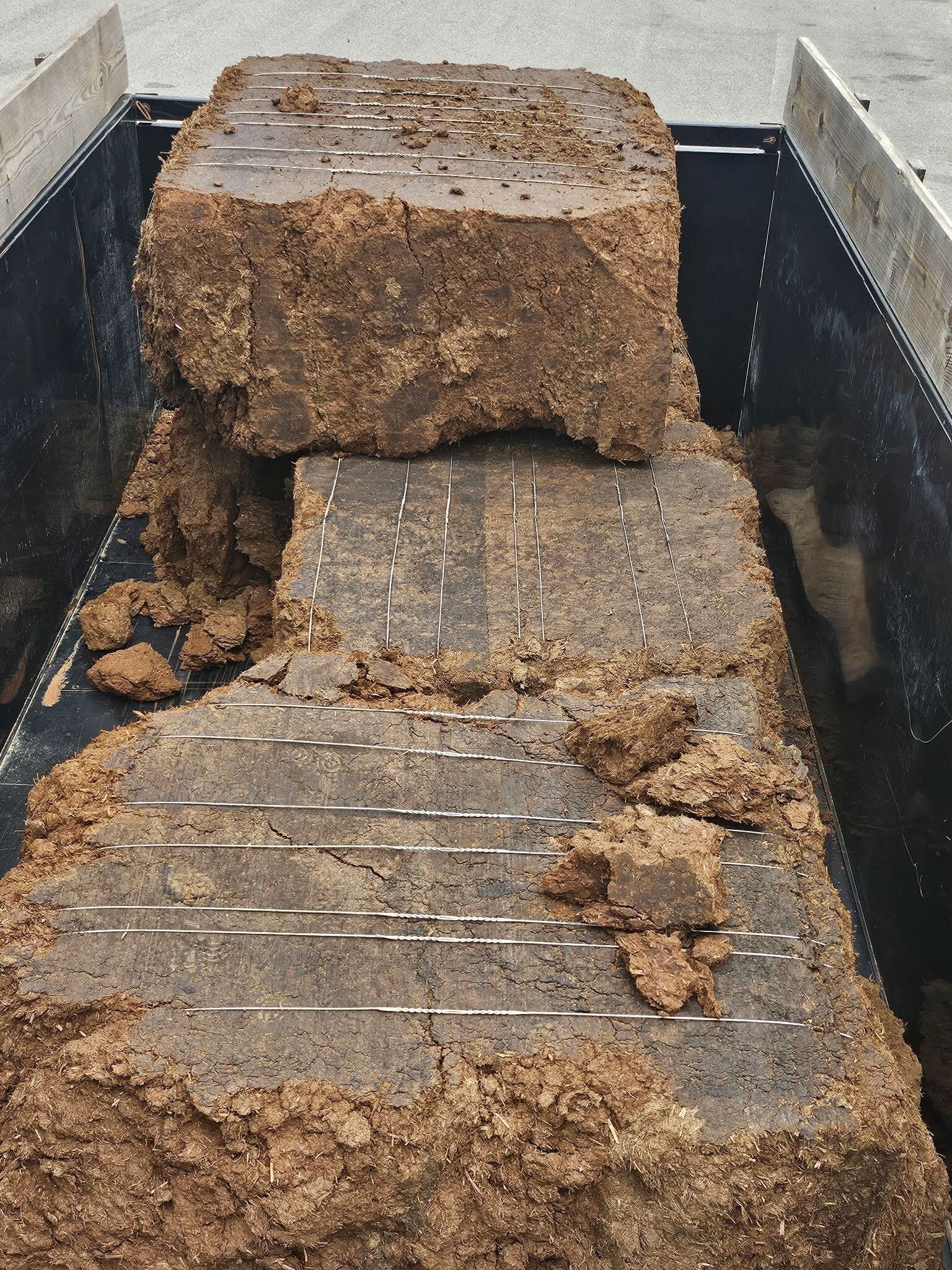 Bale integrity test showing breakage during loading prior to transport to Jefferson, TX