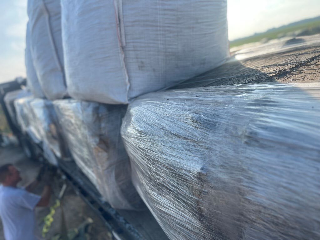 Close view of wrapped SGP+ arriving Harper, KS