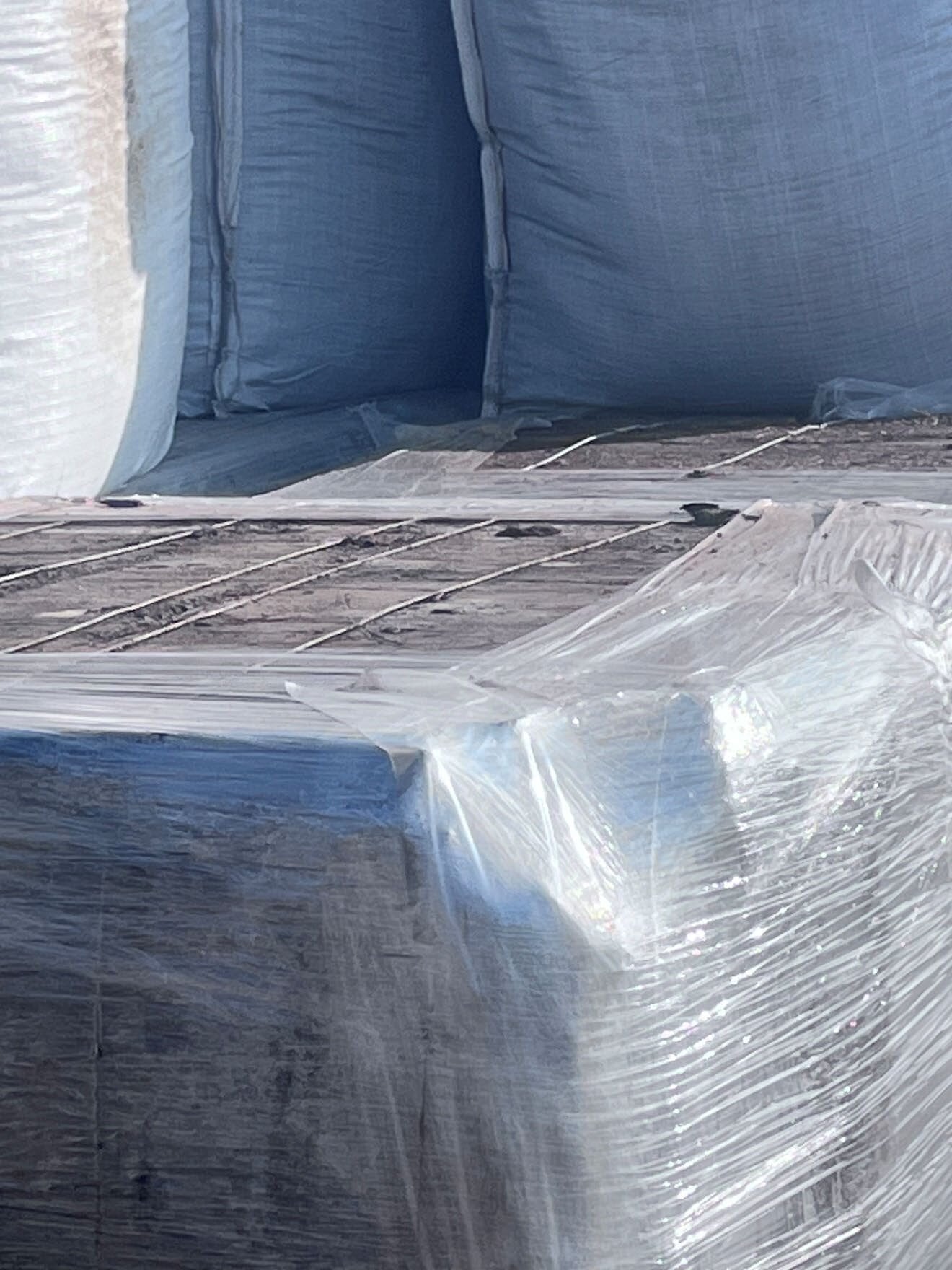 Wrapped SGP+ bales and super sacks arriving Harper, KS